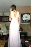 Received this dress the other day and it is beautiful! The length is a little long but will get it hemmed along with some extra fabric taken in in the breast area as it runs a little large there but otherwise fits true to size. I ordered it from Canada and did have to pay approx $30 in import fees. Looking forward to wearing it to the wedding! - Nicole K.