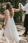 I wore this to elope in! It's stunning and I can see myself wearing this many more times! I usually wear a medium and it fit great, little loose but wouldn't change the size. This dress was perfect! - Caroline
