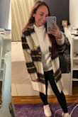 I couldn't stop thinking about this jacket when I first saw it, and ordered my original size S. When I got it I was a bit disappointed; it fit just a little too big to the point where I felt I'd be happier with it in an XS. It's MUCH better and now I am obsessed with it. So so SO soft and perfectly warm for me. Pictures show the difference between the small and extra small - Jen M.