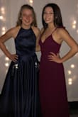 It looks gorgeous!! The color is amazing and the material is light and very soft. I bought this for Christmas Banquet and if you're looking for more of a prom style, this is a little less formal/too casual for that occasion in my opinion. However, this would be a great option for a grad party or wedding! Dress is easy to put on and you can tie it as tight as you need :) would definitely recommend. - Elliana G.