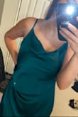 Such a gorgeous color but goes down to my mid to lower shin... getting it hemmed to right below the knee. Easy fix but still. Slit is off and sits in the middle weirdly but not awful. Adding picture after getting it fixed- looks blue-ish in the pic but it's truly emerald green - Katie C.