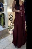 I love this dress. She fits me perfectly. On the other hand, it is made long, I am five feet nine and even with 3 inch heels the dress touches the ground. - Joanie L.