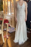 I decided to order a size down and went with an xs and I'm so glad I did, it fits perfectly! This dress is so beautiful and looks way more expensive than it is!! Highly highly recommend! - Veronica B.