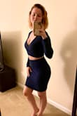 The most beautiful navy blue. I love how this can be an ensemble but also worn by themselves. Triple the use out of the purchase! The skirt isn't too tight at all and stretches a lot. I'm 3 weeks post laparoscopic surgery in those pics and it smooths my stomach instead of cutting into it. - Katie B.