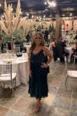 Dress was absolutely stunning. So classy and the color was perfect. - Laura F.