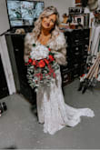 We got engaged and planned a wedding all within a month so i was very short with time with finding a dress. I never order online because i am OCD and have to see what it looks like first. I was very scared of ordering my wedding dress from lulus but i have heard nothing but good stuff so i took the chance! And it was absolutely PERFECT. Fit like a glove ! I only had to get it hemmed due to me being so short but it was everything i dreamed of and more. It was a Christmas themed wedding and a little chilly so i went ahead and added a faux shawl ;) I felt like a true princess! Thank you lulus! - Lori C.