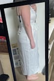 I bought this dress for my beach elopement and it was JUST what I was looking for!! I'm sort of between sizes so I purchased the L and XL, but the L was perfect and so flattering, even without spanx!  I didn't want to have to alter a maxi dress so the high-low midi is the perfect length for us shorter gals, and I love that Its not see through. The adjustable straps are great and the dress is super supportive without a bra (although you may need petals for some coverage). I'm so happy with this purchase!! - Kaitlynn H.