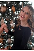 This is probably my favorite dress I've worn so far. It is classy in the front and sexy in the back. I received so many compliments and danced comfortably the whole night. - Kylee D.