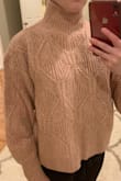 Cute sweater, soft material, and pretty color! Love it except for the neck. Unless you fold it down, it comes up very high and is awkward. - Julia S.