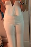 I love this jumpsuit! It's very flattering but definitely comes long. I'd say I'm average height 5'5, but have a big booty and it looks great! I want to order other colors. - Allison J.