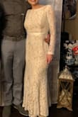 After changing our wedding plans three times, I bought 3 different dresses. My original dress from David's was $500, didn't end up wearing it due to time constraints for alterations. I found this dress and fell in love. It's always nerve wracking to order online, but sometimes ya just gotta go for it and hope for the best! It's a great dress, I love that it has a nude underlay, because of that, I was able to wear thermal leggings underneath and you couldn't tell! I'm short so had to get about 4ish inches taken off the length. I wore stick on boobs underneath and it didnt make the dress too tight on the top. This dress is so beautiful, I am petite but carry most of my weight in my hips,butt and thighs, and it was the perfect fit! Hugged my curves beautifully and elegantly. I did notice after having it shortened, there were some strings hanging from the bottom, but that could be the tailor and not because of the dress itself. Overall, 100% would recommend! - Nicole D.