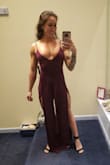 Hi! So I know the model is 5'8 and I'm only 5'3 so it was soo long on me even with heels. I had to take it to get hemmed and put cups into it because it would look weird with a bra and I do not like those sticky cup bras. I still can't wait to rock it to my championship dirt bike banquet next week! - Samantha B.