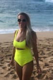 I absolutely love this swimsuit. I usually am a bikini person, but I have been searching for years for a flattering/sexy one piece to wear for days when I don't want to suck in or eat and drink a lot on the beach lol. I ordered this for my trip to Hawaii right after the holiday! This swimsuit is exactly what I imagined. The neon yellow is so fun and the suit is so soft and stretchy. I usually am a Medium or size 2/4. I ordered both the M and S and ended up keeping the small. If you are between sizes I would size down. It does loosen up a little when worn and in the water. I do agree with other viewers that it is a little thin. You can see my nipples and possibly even the aureoles in certain lighting. However, that doesn't bother me. If you concerned with that just get it in black. The only thing that would make this swimsuit better is if the straps could be tightened. While it fits me and I have worn it several times, I probably will have a seamstress take an inch off the straps for a little more lift up top. - Victoria S.