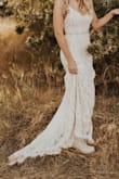 This dress fit pretty well! I did need to take it in to shorten the front, I added bra padding and a belt too. I wish it was a tad bit tighter, but I am a very petite person. - Madison A.