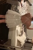 I look too much like a pixie, but otherwise it is pretty. No stretch for zipper FYI. The top would have been tighter had I adjusted it. - Megan H.