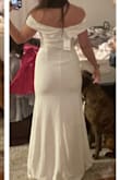 I will be wearing this for my wedding photographs and possibly for my wedding in Vegas. I will not need to get this hemmed at all, thankfully! I decided to get an XS even though the sizing says for me to get a small for my measurements. I wanted a tight fit and thats how it is with this size! Like the others say, I cant really stretch my arms all the way. In the photos I am adding now I am not wearing a bra and I am not wearing the proper panties (just trying it on) maybe Ill update with the wedding photos. Two thumbs up! - Megan H.