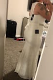 After having searched for an all lace, fitted wedding dress that would fit my hips, I've finally found the one. This dress hugged my curves like no other and I can't wait to wear it on my wedding day! - Colette T.