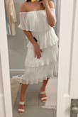 I am normally a size small and decided to size down to an xs based on the other reviews. It fits perfect and I can wait to wear it for my wedding shower! - Carley B.