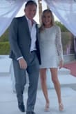 I had the sleeves shortened 1/2 inch & added a delicate rhinestone trim around the waist...and it was perfect! Everyone commented on how beautiful it was for my small backyard wedding. - SheryI J.
