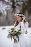 Pretty dress and comfortable! Needs to be ironed but it will be perfect for my exit dress for my wedding! Ps- still drags the ground an extra inch. And it was perfect for my bridals! - Bonnie S.