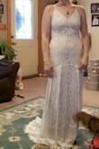 This dress was exactly what I was looking for.  The lace detail is amazing and it is comfortable.  The amazing reviews and photos enticed me to order, however the fit for me was not flattering.  I am short waisted which threw off the proportions a bit.  It did look great with the fur shrug though! The long sleeve sister to this dress is one of my favorites though.  I intended to keep both, wearing the long sleeve for my winter ceremony and this for my fall reception.  I am going to hold out and try again over the summer. - Sarah D.
