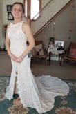 This dress is beautiful and amazing quality (like all of the Lulus items!). It was not for my body type. I have a short waist and did not sit well on me because of that. With that being said, the lace and the train are show stopping. I like the high neck and back. I did not care for the slit in the middle of the dress. I would have ordered a medium but they no longer had any, and when I read prior reviews, I felt comfortable ordering a small. I did not have any issues with the small. Would have been a nice choice for my fall reception if I had a longer torso! - Sarah D.