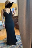 I ordered this dress in black, and let me tell you, it's a stunner. Loved it. The material felt thick (not cheap) and the M fit me like a glove. So I thought I'd also try it in white to see if it could be a wedding dress contender. Unfortunately, the white fabric revealed that it is a cheaper-made piece and for some reason just didn't look like as good of a fit in the same size. I still think the shape is gorgeous, but personally I'd buy this one in other colors over the white. - Jenny W.