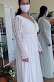 I love this dress. It fits perfectly in all the right places. I only had to hem the dress because it was long. I am wearing it to my small beach wedding. - Loren V.