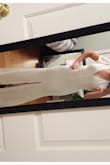 This dress is very cute and comfortable. It has a little bit of stretch and a beautiful back. I didn't end up keeping this dress because of the front slit. I didn't find it very flattering, however it may be because the dress is very long for my petite frame. I think this dress would fit someone with a longer torso much better than it fit me. Overall a lovely dress, just not for me! - Nicole V.