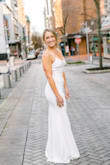 Wore this for my second wedding. Stretch material made it comfortable to wear all day. Returned a small because too big in the chest. The x-small was better fit. - Susan O.