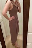 I am always hesitant to get longer dresses since I don't like to get things altered. This midi dress fits great! The front slit sits at my knee (shows to about mid-thigh when walking around) and the back is between my calf and ankle.  The straps are adjustable which I like. The material is light and cool. It's a little wrinkled from shipping but seems it would be easy to get out with a quick steam - Charna C.