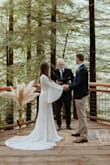 We eloped in Portland, Oregon at the Hoyt Arboretum in December of 2020. It was an absolute dream, and the dress was the most stunning addition and truly the statement piece! My bohemian elopement was perfect- I wouldn't have changed a thing!!

I did end up sewing the inner lining a touch to keep it in place along the leg slit, and hand-sewed padding to the bust as I did not fill out the dress as I would have liked. Otherwise, the material kept up with the elements, and I received many many compliments! - Kate H.