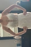 I had a similar more expensive dress picked out when I saw this dress on Lulus and I immediately fell in love with it. I was nervous ordering online/without trying it on first and what the quality would be like, but the dress is gorgeous and very well made. The attention to detail makes it hard to believe that this dress is under $300. I love how you can cinch up the back for a perfect fit & the cups in the bodice is nice, so I don't have to purchase a separate bra. I ordered up (a size 6) based on the size chart, my normal size in Lulus clothing is a 4/Small and I'm so glad I did. It fits perfectly and will not need any alterations.  I can't wait to wear this dress in October when my fiancé and I elope on the beach! - Jessica C.