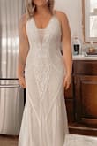 This dress is STUNNING. The beading and detail is just pure amazing. Previously ordered a large I had to get a medium. Buy it now! - Chante M.