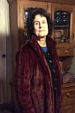 This is a beautiful coat, exactly what I had hoped for: soft, snug and well-constructed. And it has pockets!!!
The product photograph made it look a bit lighter in colour than it actually is: it is (as described) a true deep wine colour.
One customer review says it's very warm. It's probably extremely warm for California weather, but here in the icy UK I have to wear it with several layers underneath as, on its own, it's not that warm: it's good for spring, autumn, and mildish winter days - or, as said, with warm clothes underneath for colder days.
One of the things I most appreciate is that, unlike many coats, it fastens to the waist. I wanted it (believe it or not) mainly to wear on my bike: a warm covering that was long enough to give some protection to my knees, roomy enough to wear over a jacket, and with enough buttons or hooks to make sure there would be no risk of it getting caught in the wheels! For this purpose it's ideal - as well as being stylish and comfortable. I'm delighted with it! - Eva S.