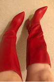 I couldn't wait to receive this shipment and it arrived quickly in Canada. These boots are such a sexy red. Would be perfect for jeans and a white tee or a cute mini skirt. I LOVE these! There is a small seam on the inner ankles that is slightly open with a cream colour showing, which may bother some people, but I'm ok with it. I'm usually a 7.5/8, these felt a little tight when I put them on but I've been wearing slipper, runners and winter boots for a while so I think they fit just right. I'll have to get used to wearing heels again. Another great Lulus purchase! My favorite online shop. - Stacey S.