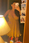 Ordered this dress as an outfit and swimsuit cover up for a trip to Jamaica. It was perfect for the tropical weather and can be dressed up or down. The straps were a little confusing, but I ended up tying as a halter and making smaller knots to keep it in place. The back portion of the dress was a little wonky, but again it's made to be a sun dress that is easy to throw on over a swimsuit. The color is gorgeous! - Angelina R.