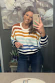 This is one of my new favorites! It's def cropped, but with high waisted jeans it looks good! The colors are stunning. I bought a large for a looser look, and it fits just right. - Krysta W.