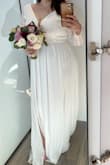 Such a flattering and beautiful dress. True to size, check your measurements. It was a bit long but shouldn't your wedding dress be long and luxurious anyway?! It's simple and elegant enough for micro wedding yet formal enough for a traditional large ceremony. I got tons and tons of compliments. I recommend getting a strapless/backless bra because it has a low back and a sheer cleavage area. I did not want to take this dress off! - Hayley R.