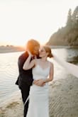 This was the most beautiful dress!  Having tried on the fanciest of dresses at BHLDN, I was taken aback by the simplicity and elegance of the dress.  It checked all my boxes: timeless, delicate details, and travel friendly.  I had the armpit brought in and the length up a touch, but it fit otherwise perfect!  We had a small ceremony before traveling to the west coast for an elopement photoshoot.  I'm pretty sure my husband loved the dress--and it looked so perfect next to the Pacific.  I am overjoyed when I can tell people my wedding dress was under $100!  I'll get to wear it one more time this next August when we celebrate our one-year anniversary at our larger wedding reception with our full guest list.  Thank you Lulus! - Kimberly Z.