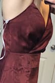 My bust is 34-35" and I wear 32C/34B bras, but there was way too much room in the size small. The rest of the dress fit perfectly, but this looks too awkward in person to ignore. It is very long, so I'd need that tailored as well, so I'll be returning this - Elise D.
