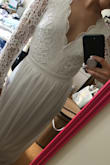 OK, so my first post got deleted, but I love this dress so much that I am willing to re-write this. When I tried this on, I could tell that the quality was great. The top is thick and well detailed, and the bottom is smooth and gorgeous. The bust is a little loose for me, but nothing a little taking in and cups can't fix! The bottom is a bit long as well, but can be hemmed or worn with high heels. I wasn't sure about purchasing this, but once I saw the thousands of positive reviews, I thought why not! I am really happy I did. I purchased this for my rehearsal dinner in October, and I am so excited! Thanks Lulus! - Angela C.