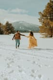 I purchased this dress for engagement pictures, and loved the way the color of it came out. It is very long, and I didn't have time to get it hemmed. - Janet I.