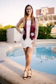 The neckline gives me 80's vibes and I love it!! Rides up when you walk but still a great dress for a fancier event!! - Emme M.