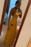 It is so nice and the color is great. It is also made with a good material so it is not see through at all and is lovely and flowy. I usually would buy a medium but went with a small and it fits comfortably like a medium would. I found it runs a little bigger. - Lisa N.