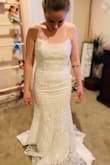 This dress is beyond beautiful. The material is thick, heavy, and doesn't look cheap at all. I instantly fell in love with this dress when I saw it and then fell even more in love when it arrived and I laid eyes on it myself. Well worth the buy, I highly recommend it. - Ashley S.