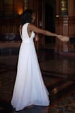 I have this dress in pink as well that I wore to a wedding years ago. Even then, I kind of knew that I wanted it in white as my future reception or even wedding dress. Due to the pandemic, I had a small wedding of only six people at our City Hall, and this was truly perfect for it. It felt simple yet elegant, and so comfortable. I didn't wear a bra with it because my chest is on the smaller side and can get away with it. The shoulders could have been tailored just a little bit but that's because I have wide shoulders and a short torso. The quality of it is great without being too heavy yet still feels expensive. It's such a good deal for the price range. - Sosothabna N.