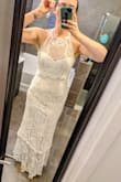 Please note, I am 5'10" and wearing heels in this picture. I love this dress. This dress is perfection. I do not know that if I was even half an inch shorter that I would enjoy the flow of this dress as much un-altered. But the way the tiers hang make it pretty easy to alter the length though, if you wanted to. The fabric and lace details look and feel high quality. The fabric is comfortable and lightweight. - Chance R.