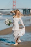LOVE this dress. A little loose in the bust area and sleeves, but I'm pretty flat chested, otherwise it fit like a glove. I got so many compliments on it, it's comfortable and was perfect for our winter day beach elopement! - Alex T.