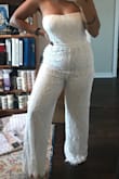 OKay.... I love the look of this jumpsuit! Though it is snug around my hips (expected) and a little loose fitting around my bust (also expected), I think is so cute! Material is also high quality. - Ashley D.